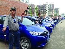 50多位残疾人开了间汽车租赁公司